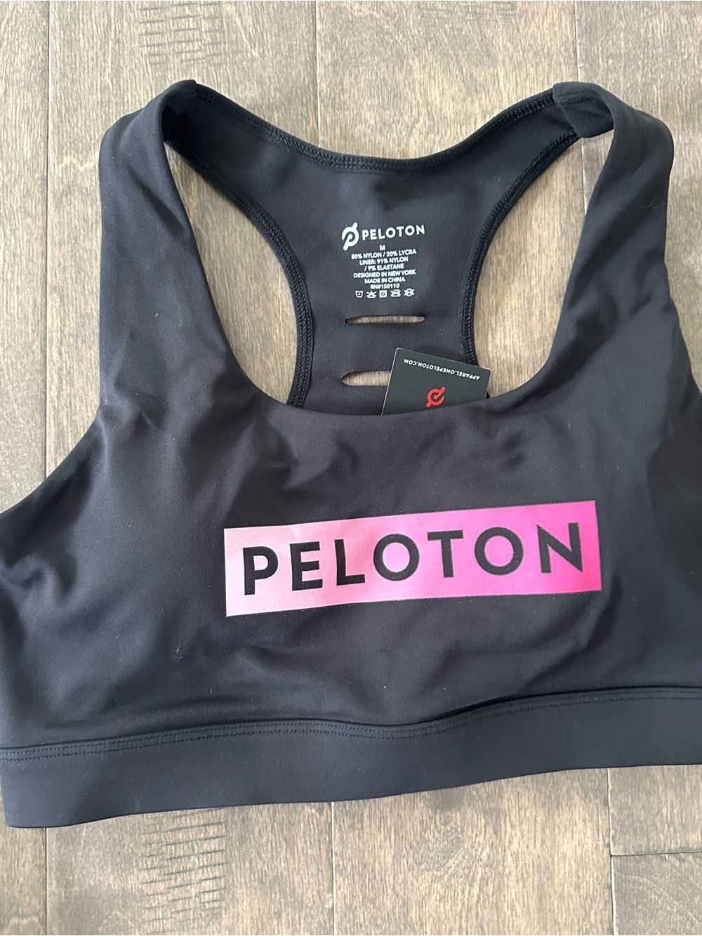 NWT: Peloton Black Sports Bra with Pink Logo Panel